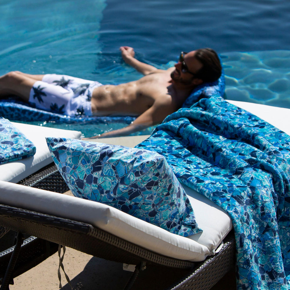 
                  
                    Load image into Gallery viewer, Poolside relaxing with Camino Lagoon Pillow Covers and Beach Towels.
                  
                