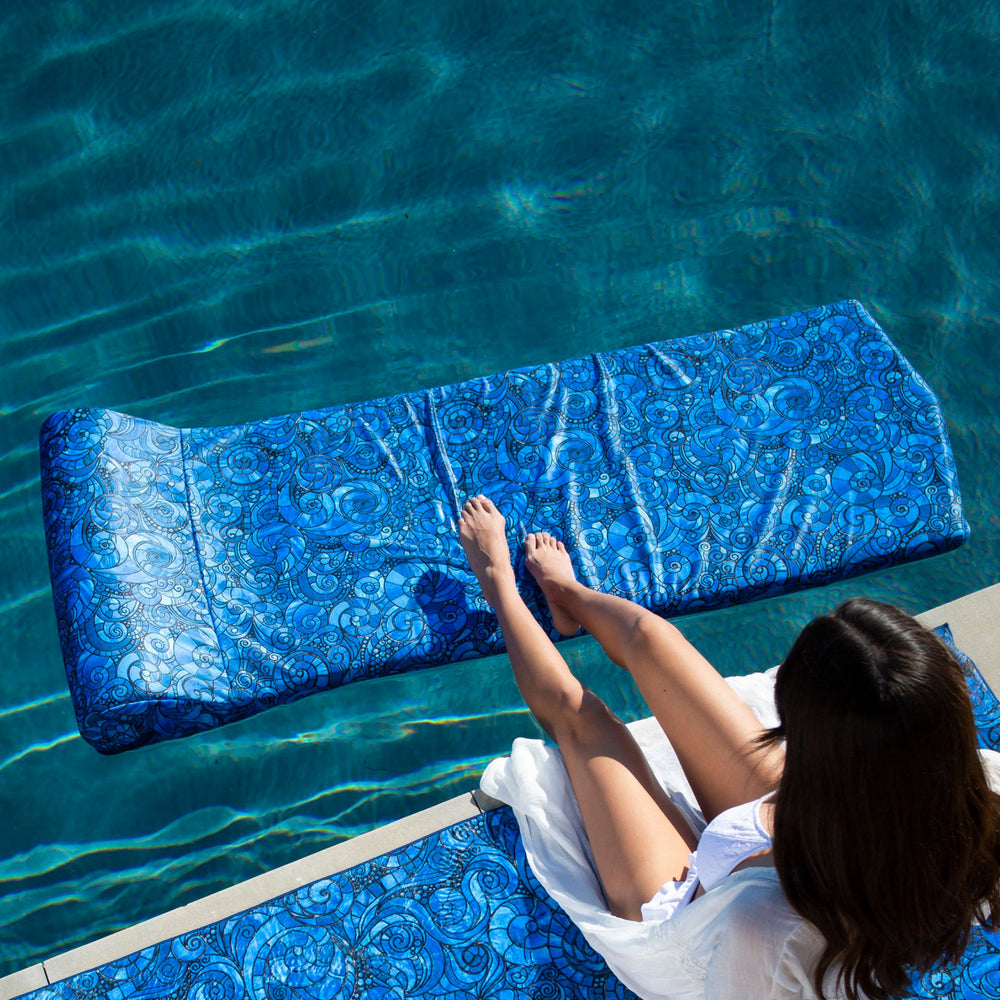 
                  
                    Load image into Gallery viewer, Woman with a stunning Maya pool float.
                  
                