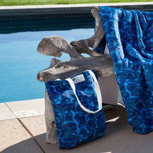 
                  
                    Load image into Gallery viewer, Beautiful Indigo Seas Beach Tote by the pool.
                  
                