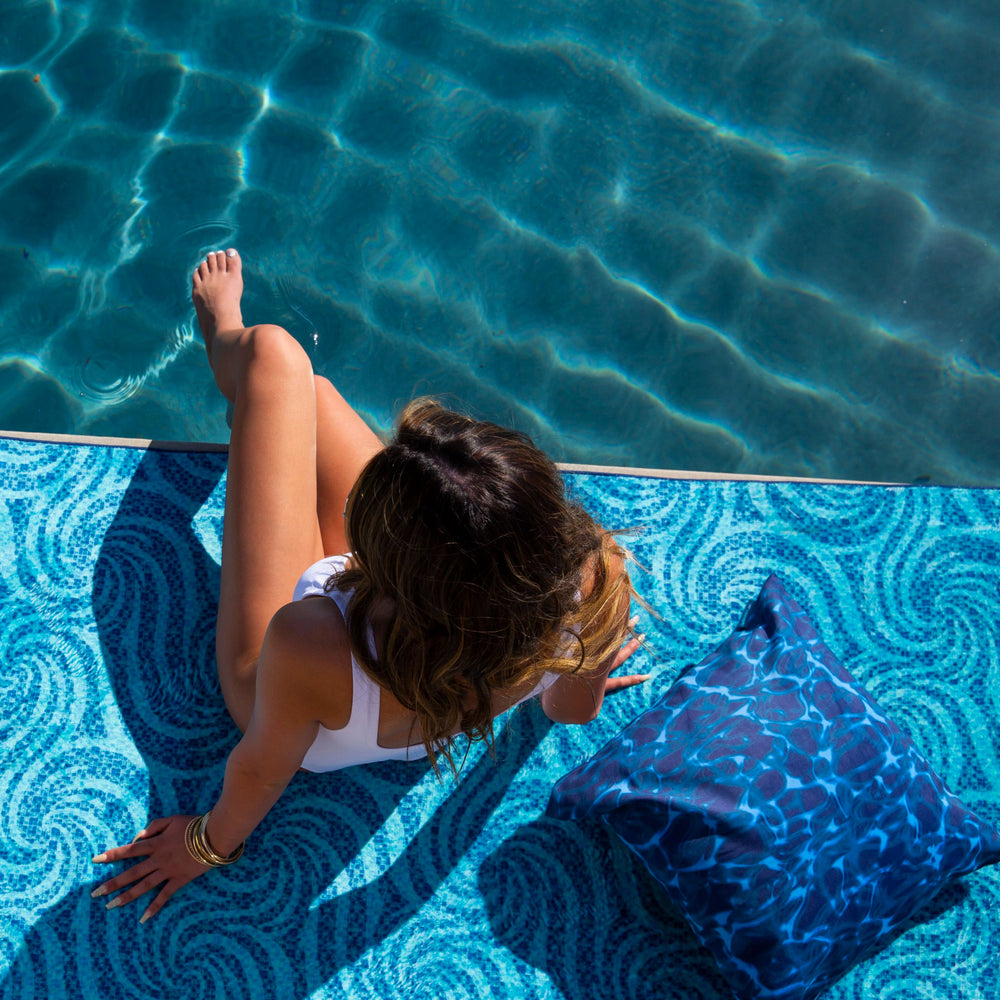 
                  
                    Load image into Gallery viewer, Poolside relaxing with Indigo Seas Pillow Covers and Beach Towels.
                  
                