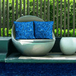 Poolside seating featuring Maya pillow covers.