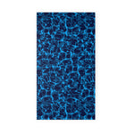 Luxurious Beach Towel in Indigo Seas Pattern.